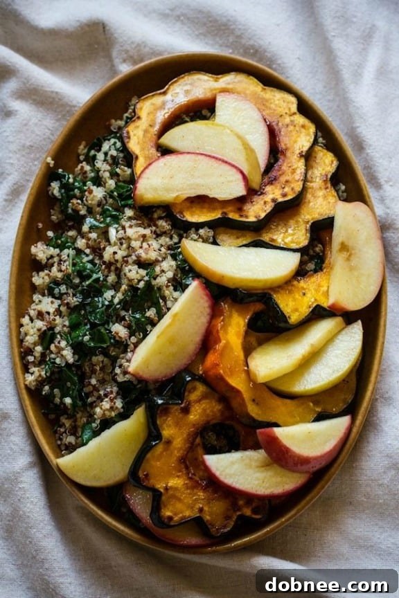 Roasted Acorn Squash and Apples with Quinoa, Kale, and Maple Tahini Dressing