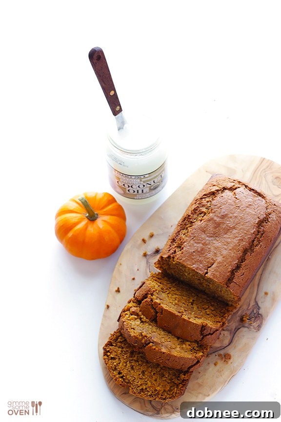 Freshly baked Coconut Oil Pumpkin Bread cooling in the pan, filling the kitchen with fall aromas