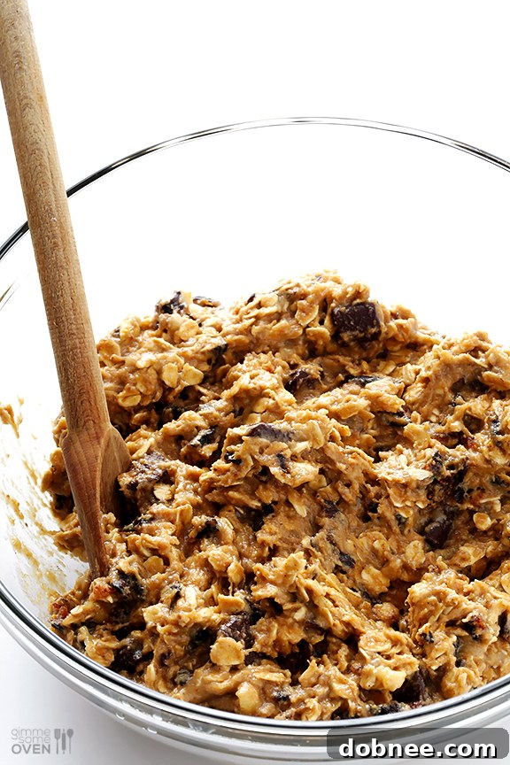 Preparing Breakfast Cookies Unbaked breakfast cookie dough on a baking sheet, ready for the oven.