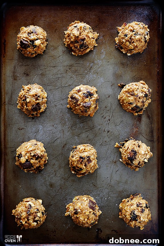 Mixing Breakfast Cookie Dough Mixing the wholesome ingredients for delicious breakfast cookies in a bowl.