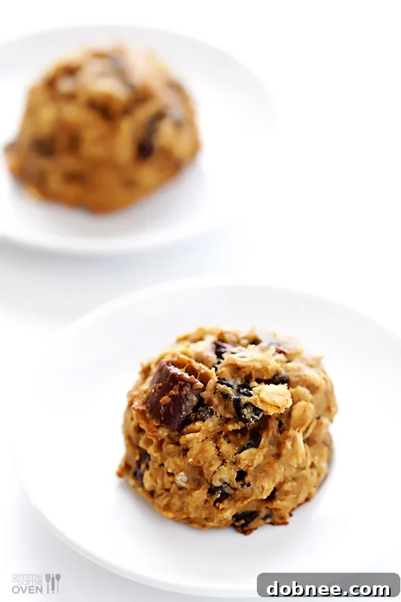 Breakfast Cookie Enjoyment Enjoying a freshly baked breakfast cookie with a cup of coffee.
