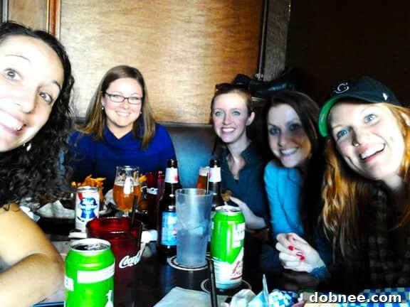 Author cheering on the Kansas City Royals at a dive bar in 2014, celebrating their World Series qualification.