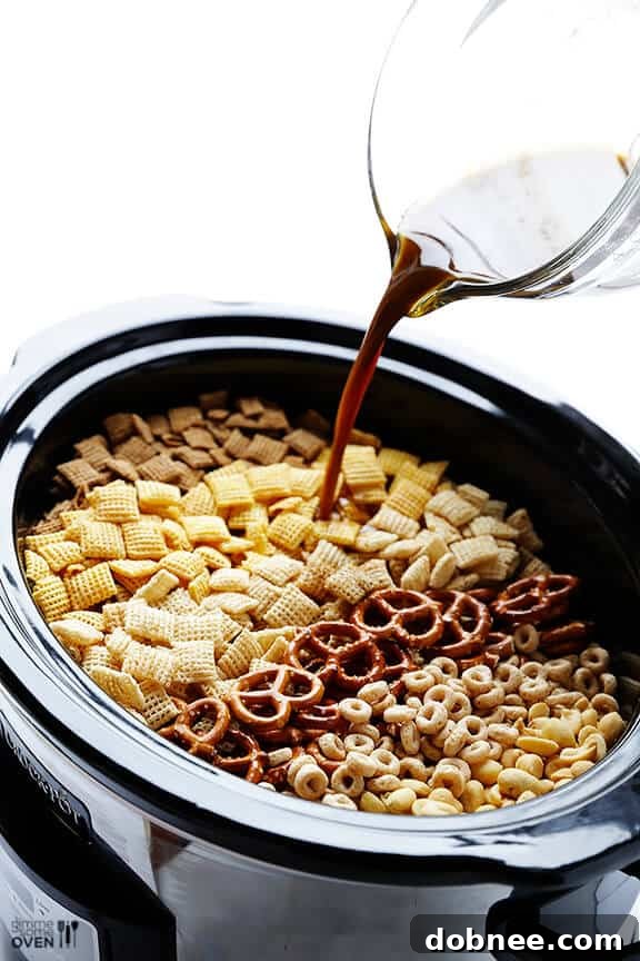 Mixing Ingredients for Slow Cooker Chex Mix