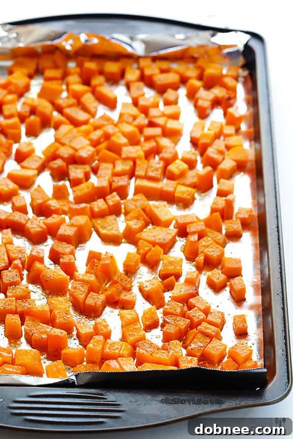 A serving of golden-baked Butternut Squash Alfredo Stuffed Shells, ready to be enjoyed.