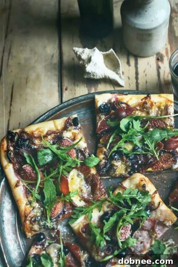 Waiheke Pizza with Figs, Grapes, Blue Cheese & Prosciutto, a unique and elegant fall pizza.