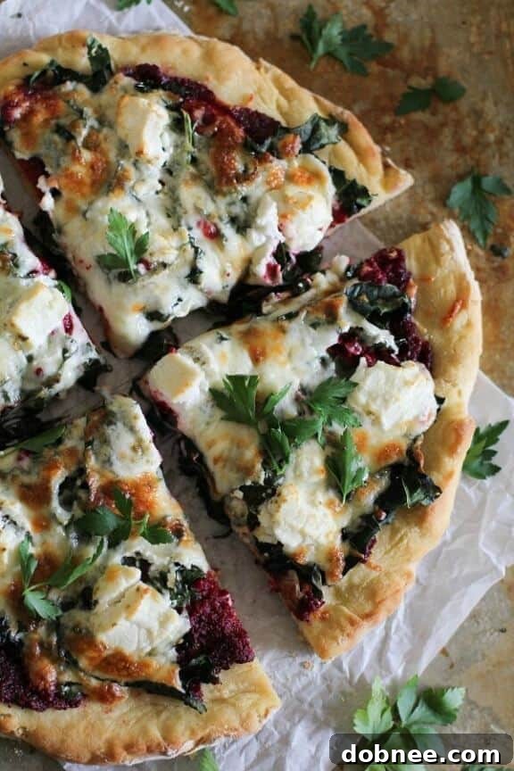Beet Pesto Pizza with Kale and Goat Cheese, a vibrant and earthy vegetarian pizza.