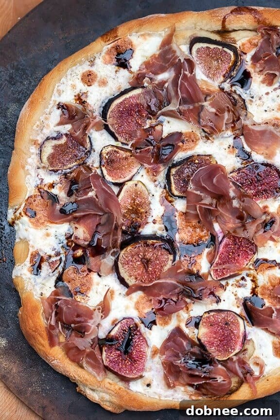 Fig and Prosciutto Pizza with Balsamic Drizzle, a gourmet fall pizza with sweet and salty notes.