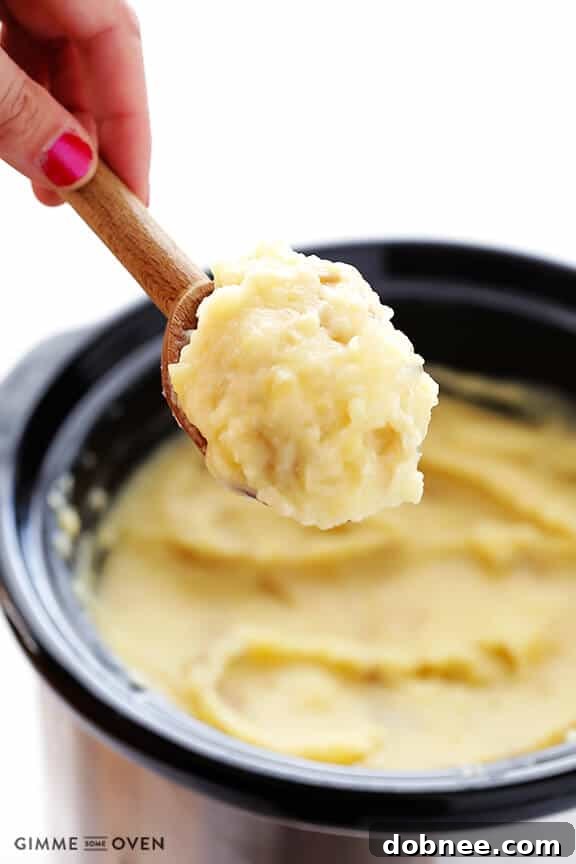 Effortless Slow Cooker Mashed Potatoes 2 Slow Cooker Mashed Potatoes Recipe | gimmesomeoven.com #slowcooker #crockpot