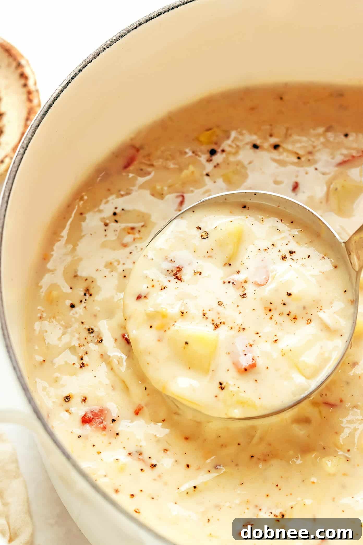 Homemade creamy potato soup recipe, a comforting and easy dish.