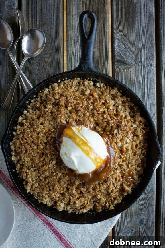 Warm Brown Butter, Amaretto and Pear Crumble with a crisp topping