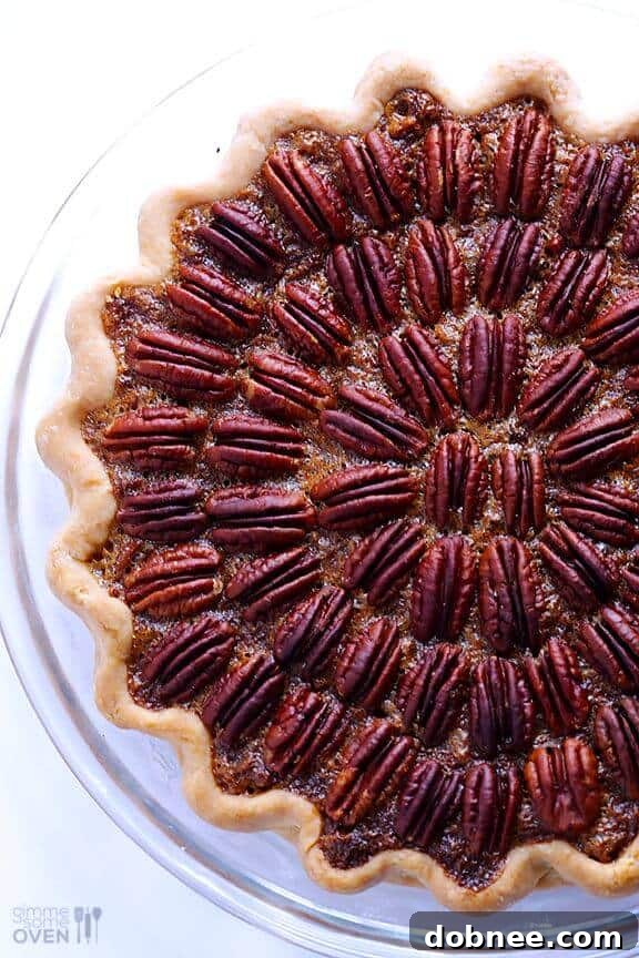 Classic Golden Pecan Pie with a shiny, nutty filling