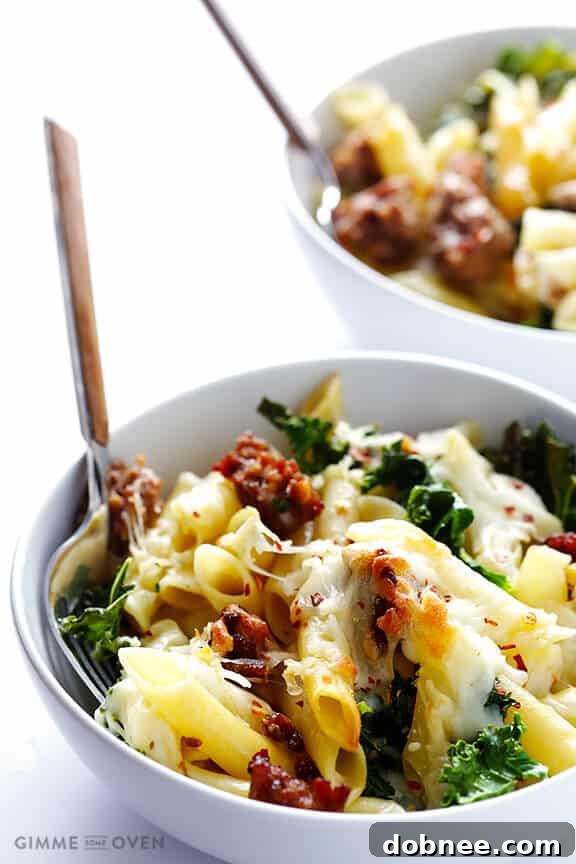 Close-up of baked Italian sausage and kale ziti, fresh from the oven