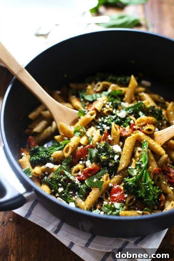 Bright and fresh 20-minute lemon pesto penne, garnished with lemon zest and fresh herbs.