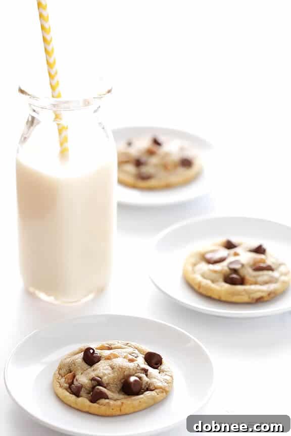 A plate of warm Toffee Chocolate Chip Cookies, ready to be served.