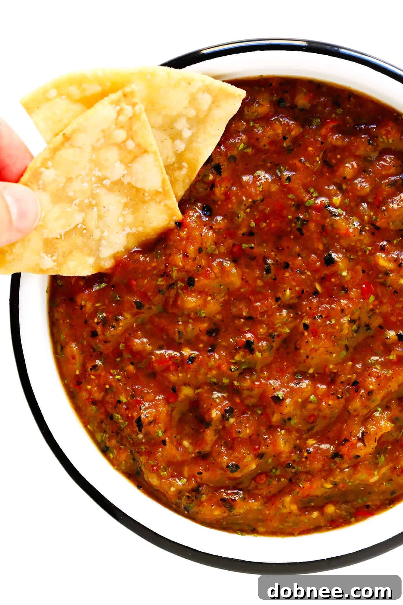Fire-Kissed Tomato Salsa 2 Freshly made roasted tomato salsa with tortilla chips