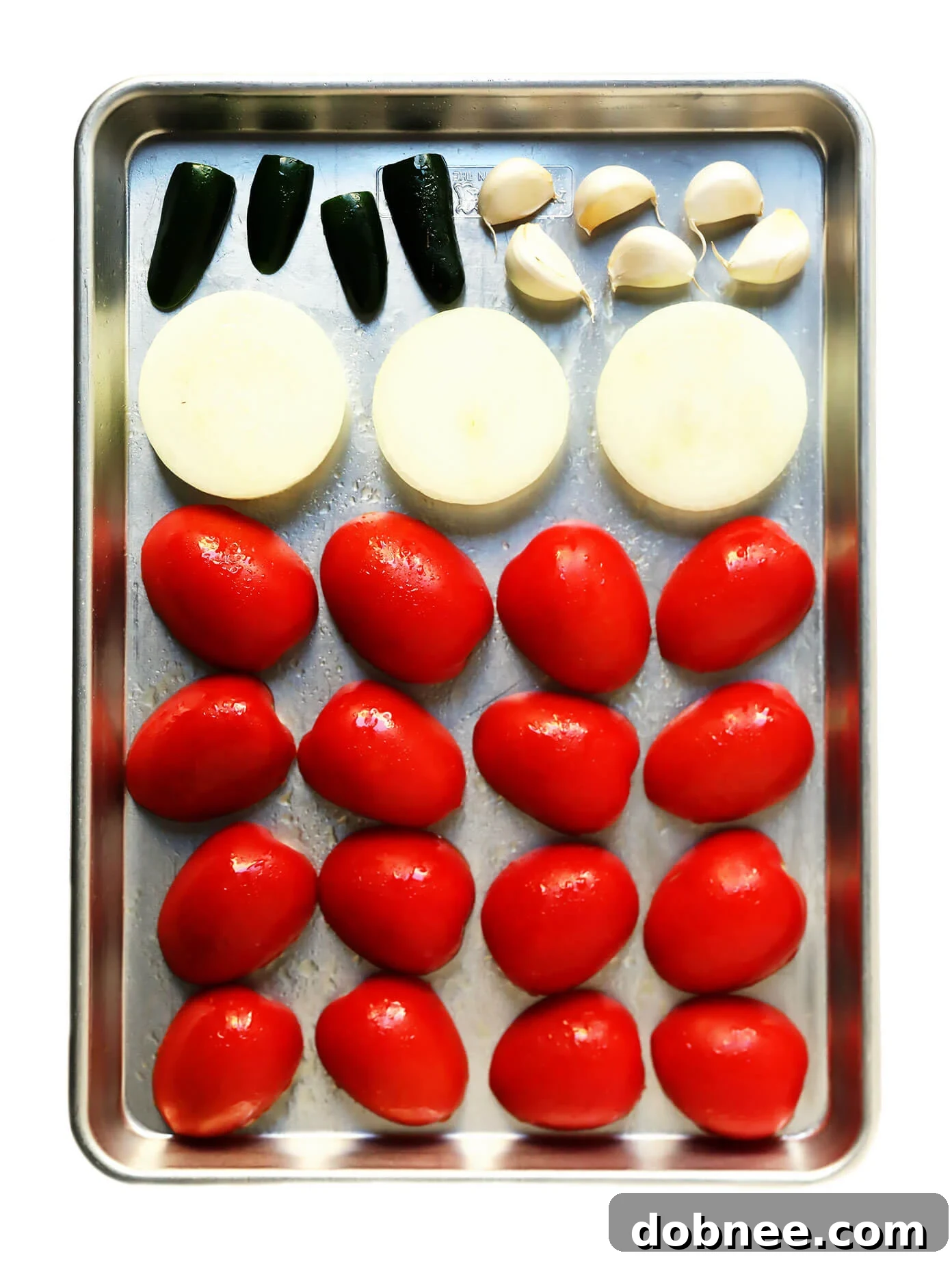 Fire-Kissed Tomato Salsa 3 Close-up of roasted tomatoes and other ingredients for salsa