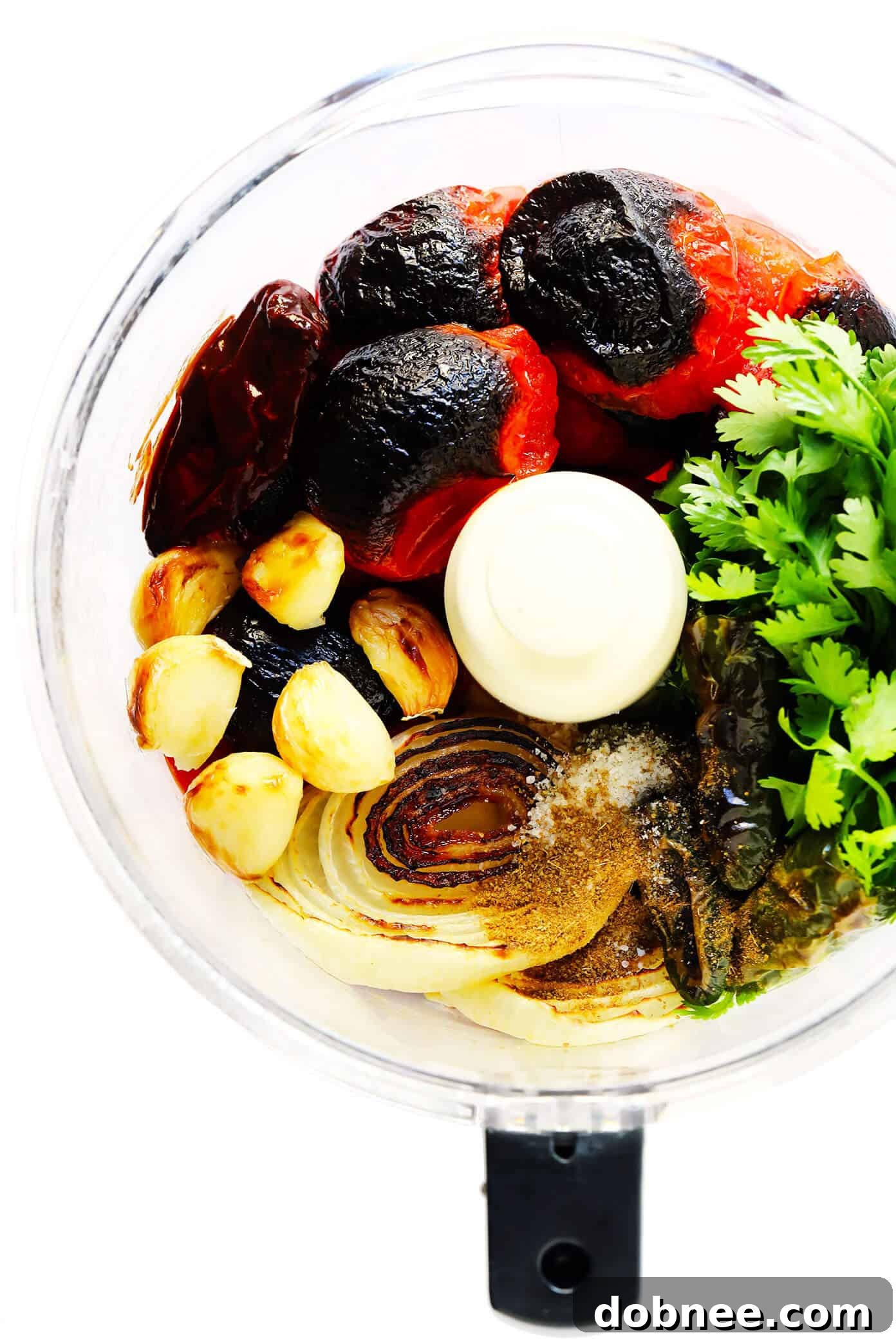 Fire-Kissed Tomato Salsa 4 Roasted tomatoes, garlic, onion, and jalapeño on a baking sheet