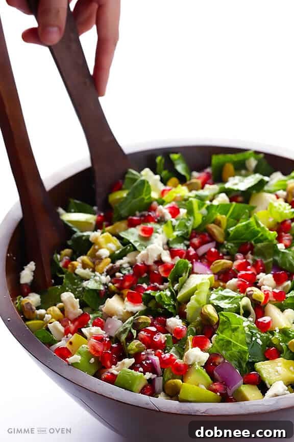 The Pomegranate Pear Avocado Salad combines sweet, creamy, and crunchy textures for an unforgettable taste experience.