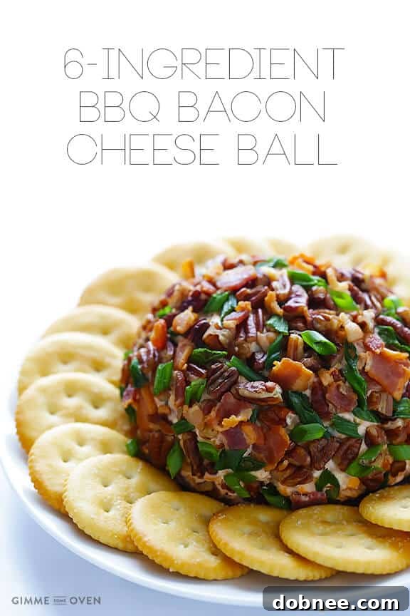 Bacon BBQ Cheese Bomb 10 A serving of BBQ Bacon Cheese Ball on a platter with crackers and fresh vegetables.