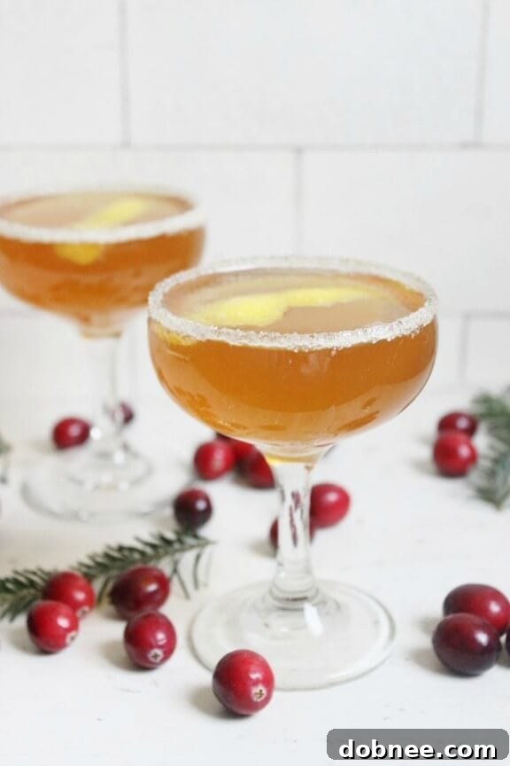 Aromatic Earl Grey French 75 cocktail with lemon peel garnish