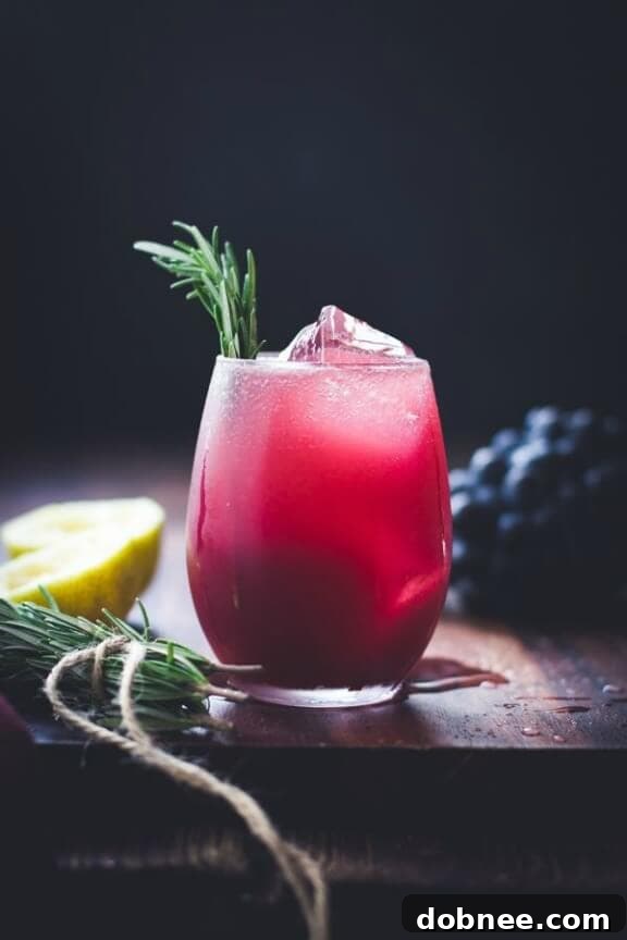 Refreshing Zinfandel, Grape, Rosemary Gin Crush cocktail with fresh grapes