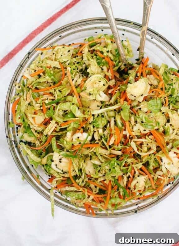 Asian Brussels Sprout Slaw with Carrots and Almonds