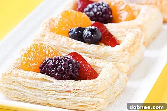 Delicious Berry and Ricotta Danishes on a cooling rack