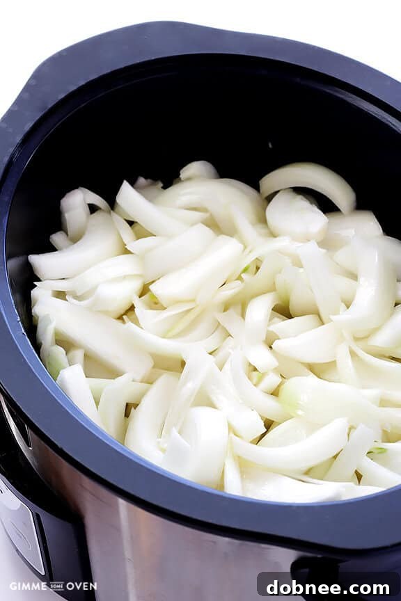 Sliced Onions Ready for Caramelization in a Slow Cooker