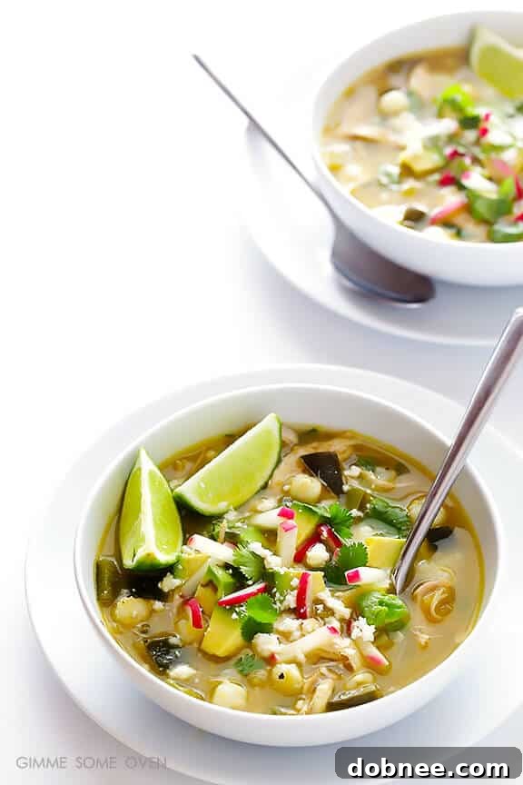 Easy Chicken Posole Verde, showcasing vibrant green hues and tender chicken, perfect for a quick dinner.