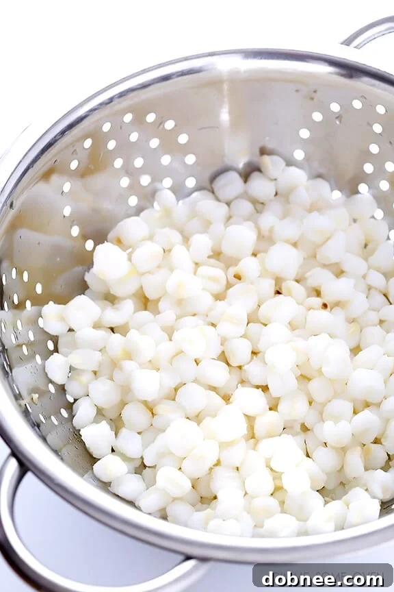 Close-up of hominy, the essential ingredient in Posole, highlighting its unique texture.