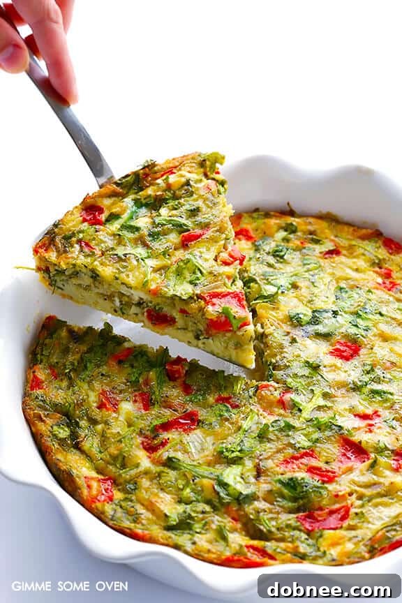 Baked Frittata with Roasted Red Peppers, Arugula and Pesto - A vibrant, gluten-free dish perfect for brunch.
