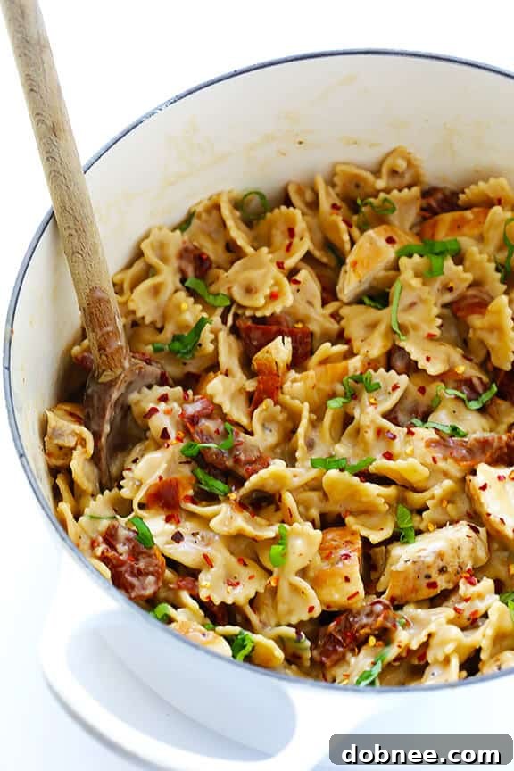 Creamy Pasta with Chicken & Sun-Dried Tomatoes, a delicious and lightened-up meal for any night