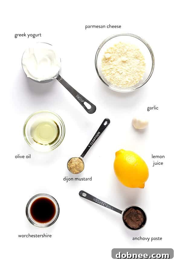 Healthy Caesar Dressing made with Greek yogurt, served on a fresh salad