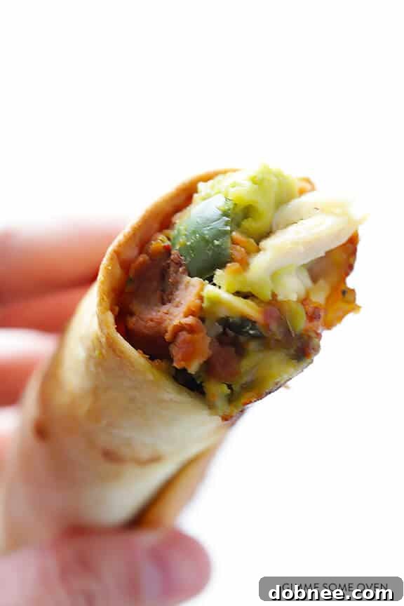 Effortless 5-Ingredient Chicken Guacamole Taquitos 7 Plate of 5-Ingredient Chicken Guacamole Taquitos, ready to serve.