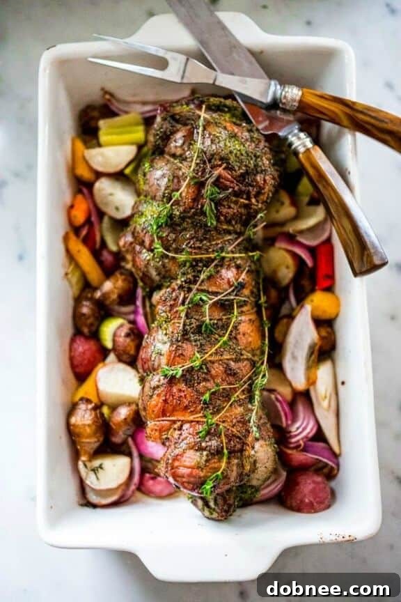 Herb Crusted Leg of Lamb with Mint Gremolata | feastingathome.com