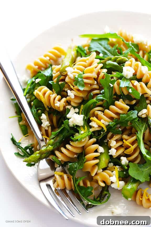 Vibrant green Asparagus and Arugula Pasta Salad, celebrating spring