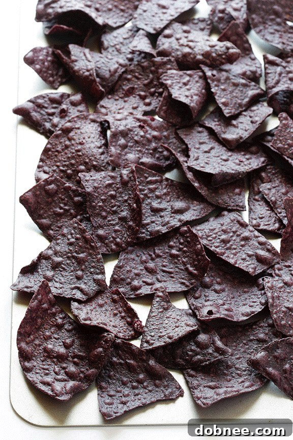 Kaleidoscope Fish Taco Nachos 6 Freshly prepared rainbow mango slaw in a bowl, a key topping for Fish Taco Nachos.