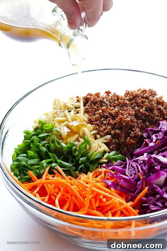 A bowl of freshly prepared sesame vinaigrette, ready to be poured over the salad.
