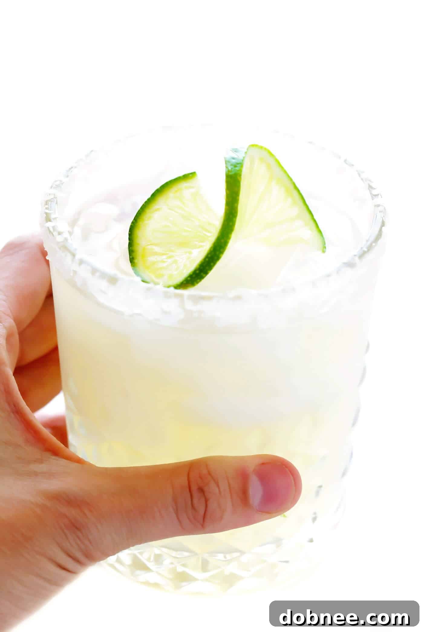 The Ultimate 3-Ingredient Classic Margarita Recipe Refreshing Classic Margarita Cocktail with Lime Garnish