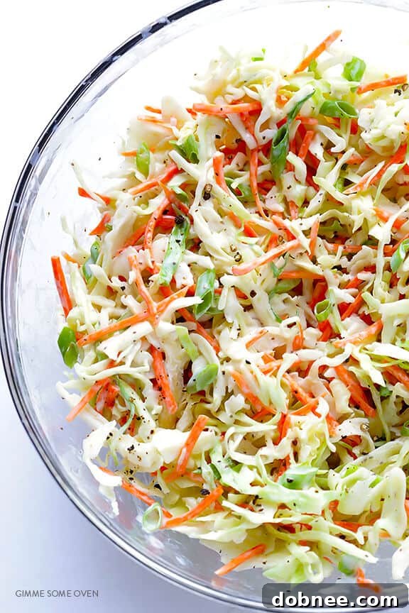Greek Yogurt Coleslaw -- the classic coleslaw we all love, lightened up with Greek yogurt instead of mayo and ready to go in 5 minutes! | dobnee.com