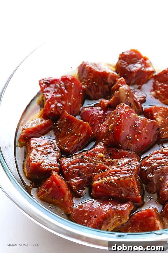 Asian Pepper Steak Kabobs on the grill, sizzling to perfection with a beautiful char.