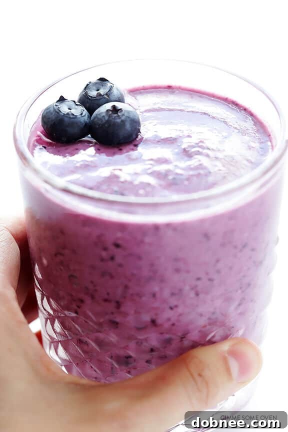 Blueberry Muffin Smoothie with a straw, ready for a healthy meal.