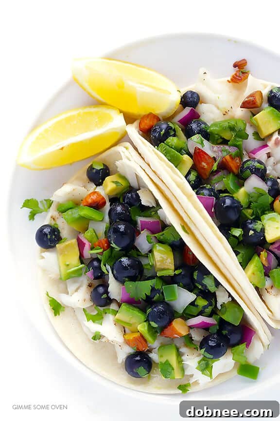 Fish Tacos with Blueberry-Almond Salsa -- perfectly sweet and savory, naturally gluten-free, and SO GOOD! | gimmesomeoven.com