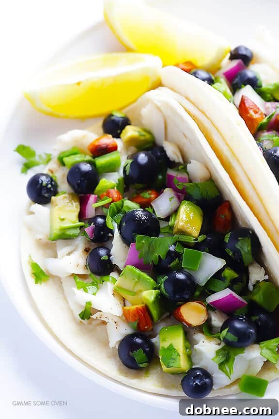 Fish Tacos with Blueberry-Almond Salsa -- perfectly sweet and savory, naturally gluten-free, and SO GOOD! | gimmesomeoven.com