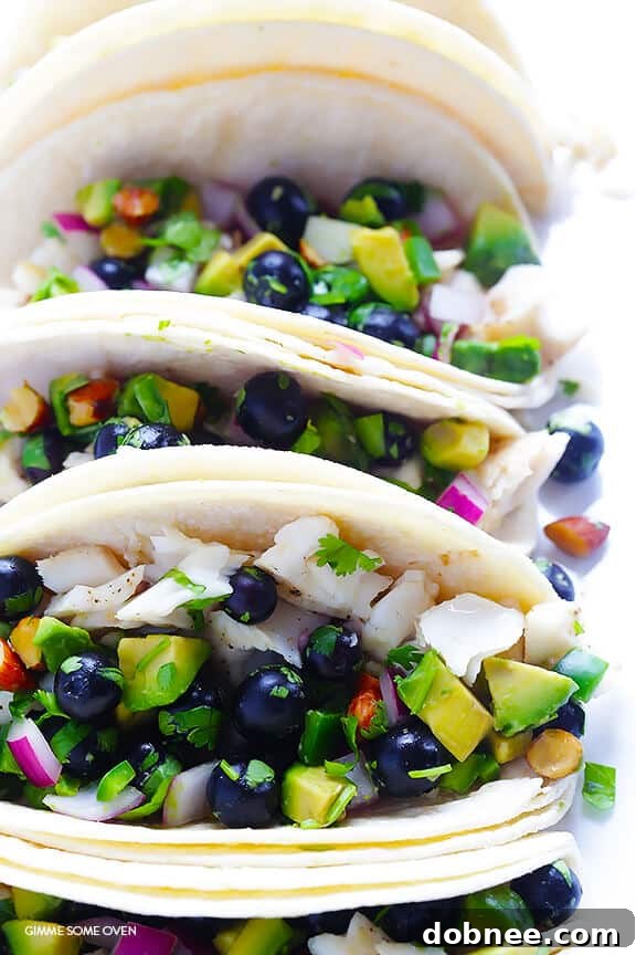 Fish Tacos with Blueberry-Almond Salsa -- perfectly sweet and savory, naturally gluten-free, and SO GOOD! | gimmesomeoven.com