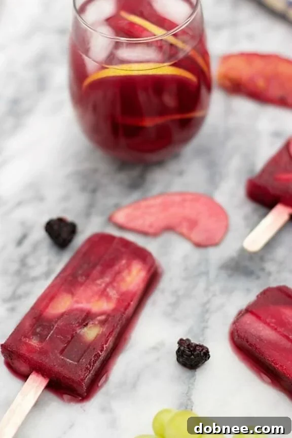 15 Stunning Summer Popsicle Treats 16 Celebratory Sangria Popsicles by B. Britnell, a fruity and boozy adult treat.