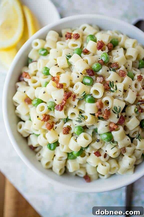 Summer Macaroni Salad with Crispy Pancetta and Petite Peas in Lemon-Thyme Dressing by The Cozy Apron