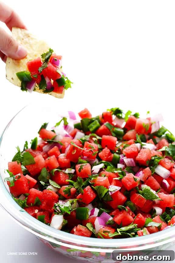 Close-up of freshly tossed watermelon salsa in a bowl.