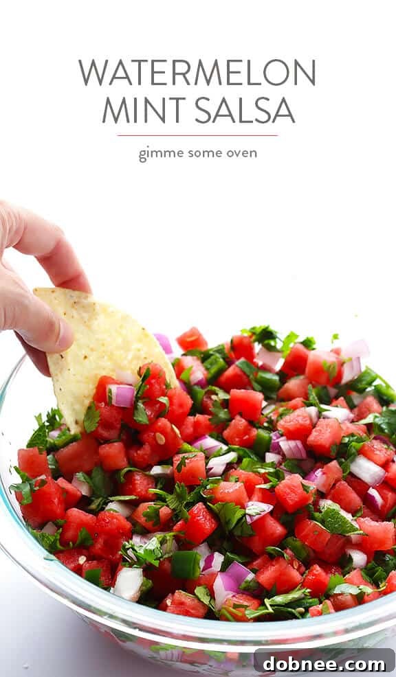Watermelon Salsa served in a bowl with tortilla chips.