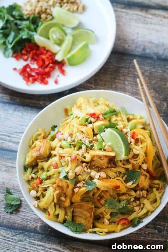 Savory Tofu Curry Noodles with Vegetables, a delicious and wholesome vegetarian Asian-inspired dish.